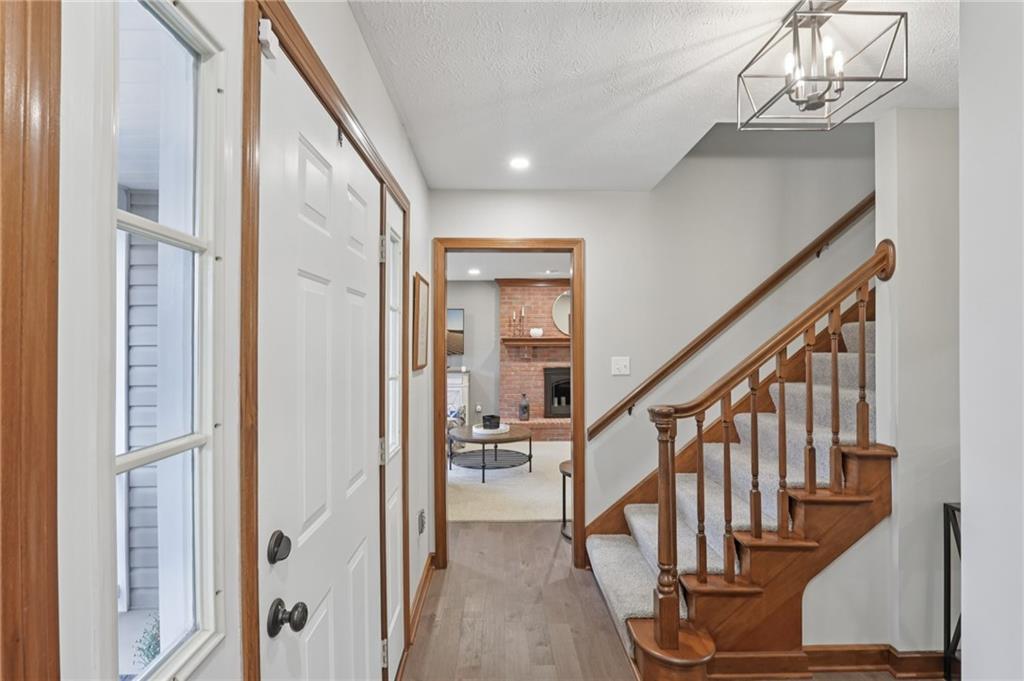 111 American School Road Harmony, PA 16037 - Photo 6 of 46 a view of entryway and hall with wooden floor