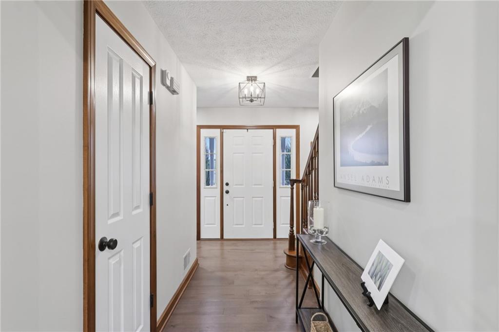 111 American School Road Harmony, PA 16037 - Photo 7 of 46 a view of a hallway with front door