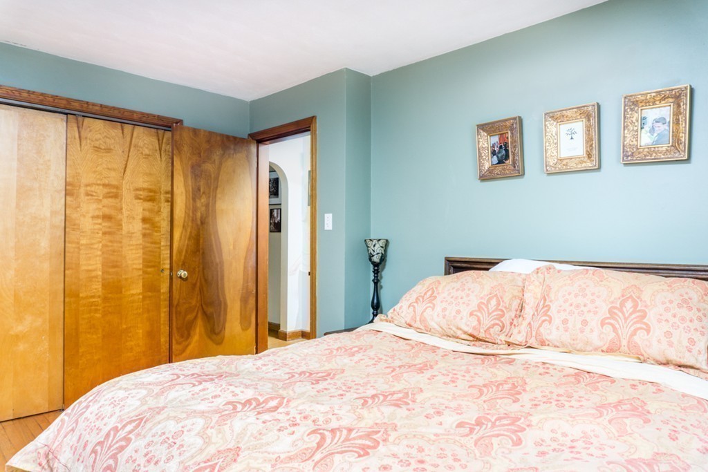 2032 Calkins Road Palmer, MA 01069 - Photo 12 of 23 a bedroom with a bed and a window