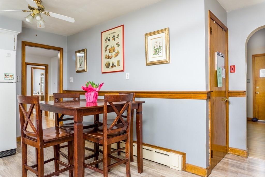 2032 Calkins Road Palmer, MA 01069 - Photo 3 of 23 a dining room with furniture and wooden floor