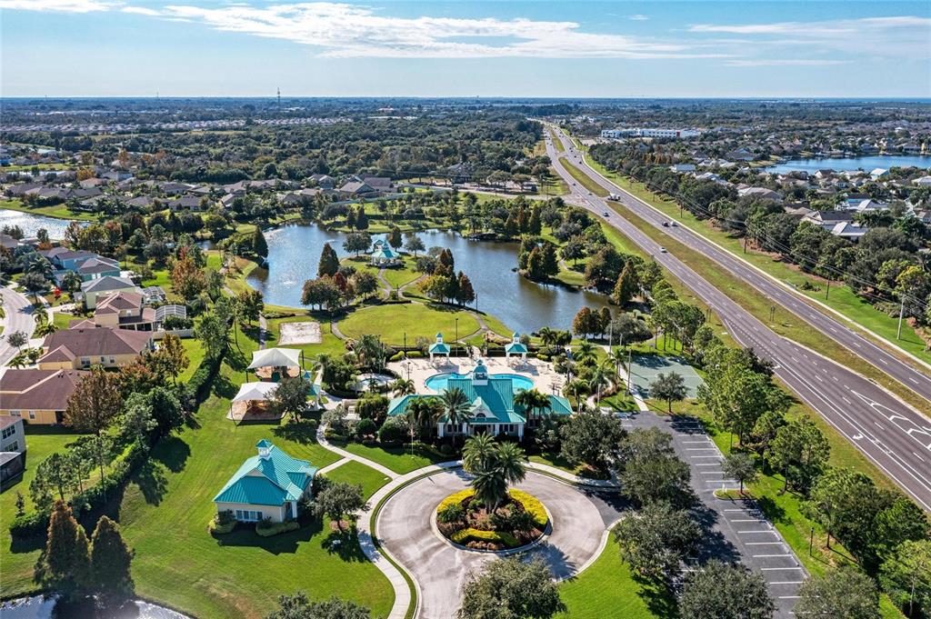 302 Cockle Shell Loop Apollo Beach, FL 33572 - Photo 67 of 75 an aerial view of residential houses with outdoor space