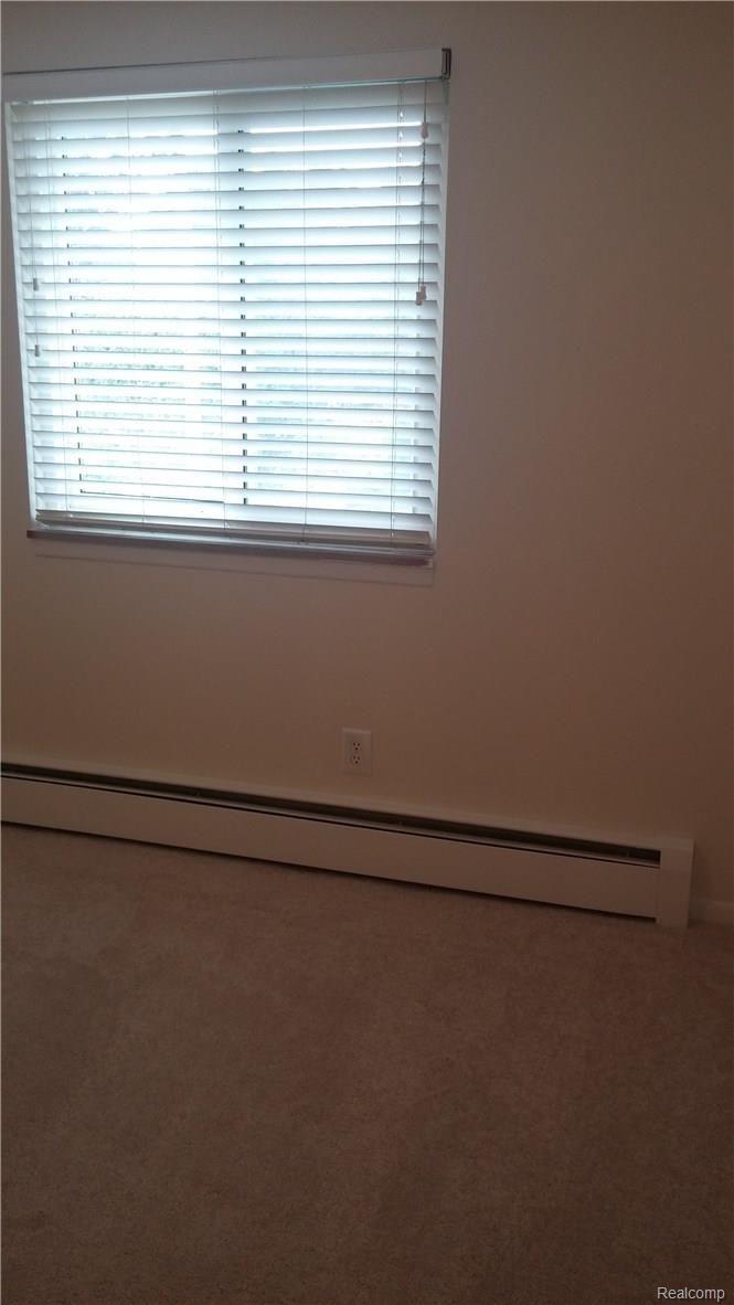 1123 Tienken Court, Unit 11 Rochester, MI 48306 - Photo 5 of 19 0623161511a.jpg