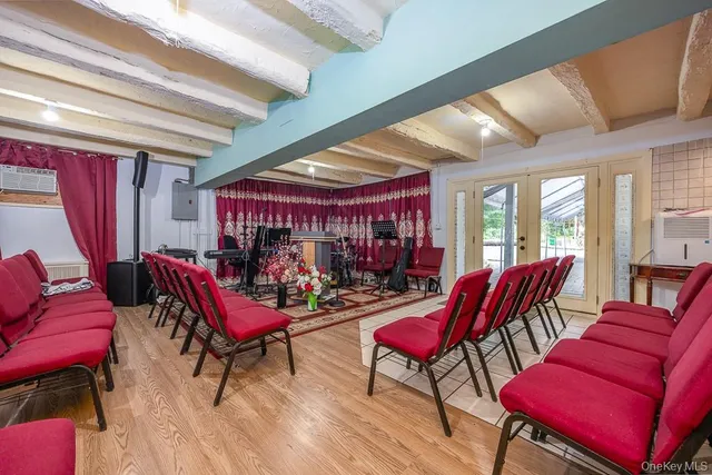 a outdoor living space with furniture and a rug