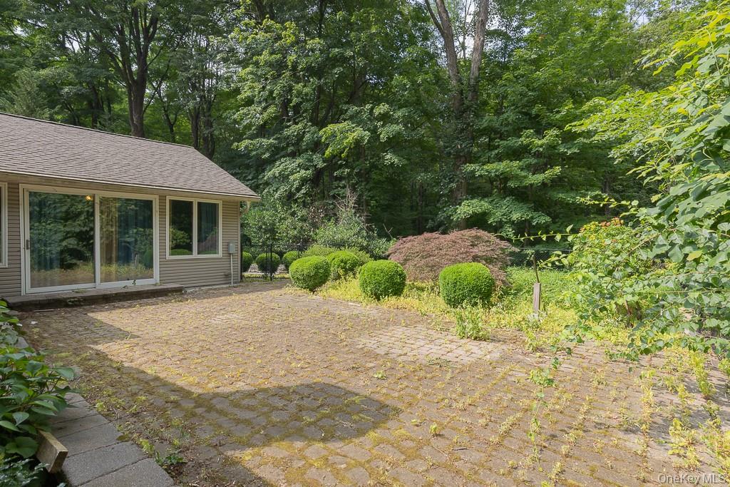 23 Sky Meadow Road Suffern, NY 10901 - Photo 23 of 36 a view of a house with a yard and large tree