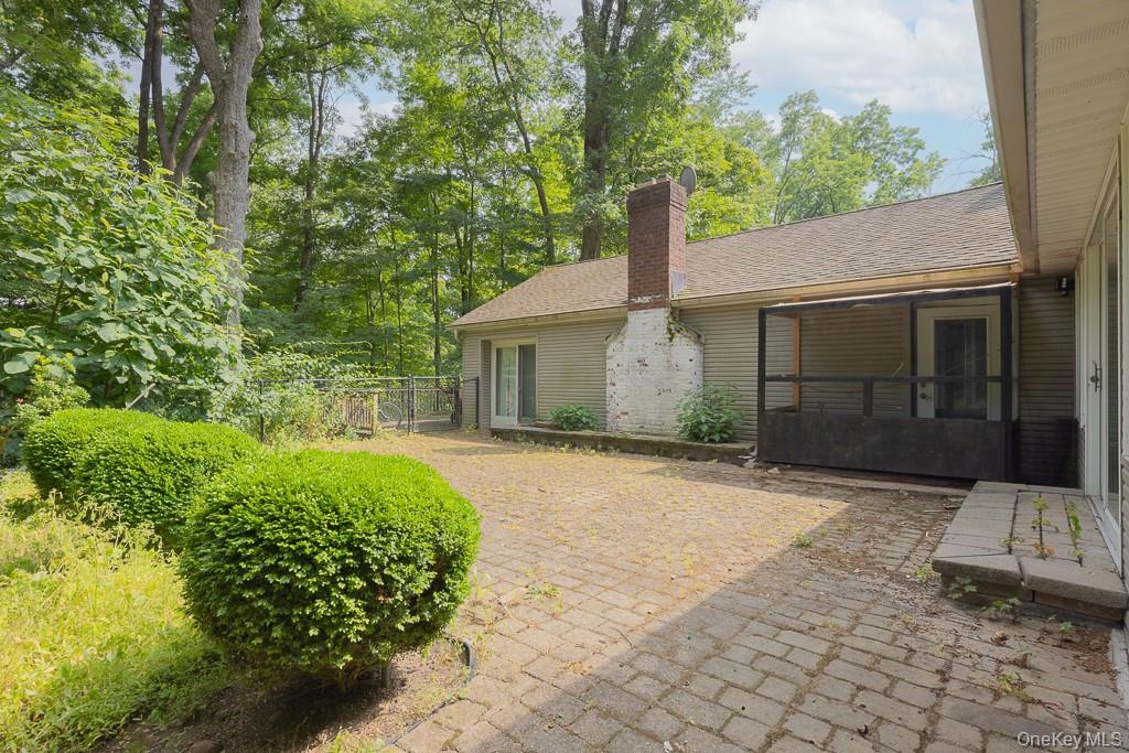23 Sky Meadow Road Suffern, NY 10901 - Photo 24 of 36 a front view of a house with a yard and garage