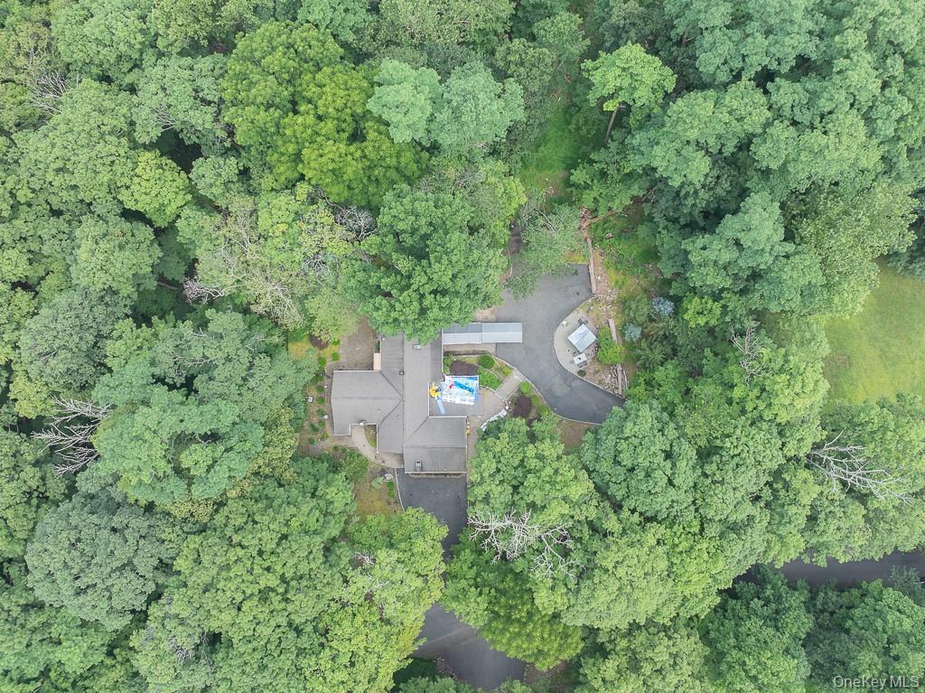 23 Sky Meadow Road Suffern, NY 10901 - Photo 34 of 36 an aerial view of a house with a yard and outdoor seating