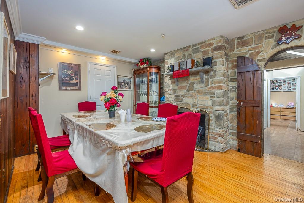 23 Sky Meadow Road Suffern, NY 10901 - Photo 8 of 36 a view of a dining room with furniture and wooden floor