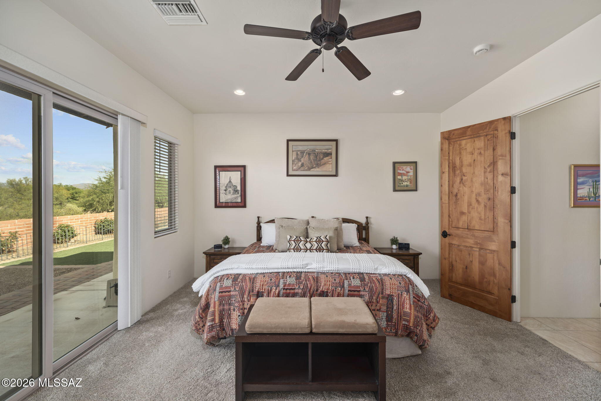 45 High View Court Tubac, AZ 85646 - Photo 23 of 44 a bedroom with a bed and large window
