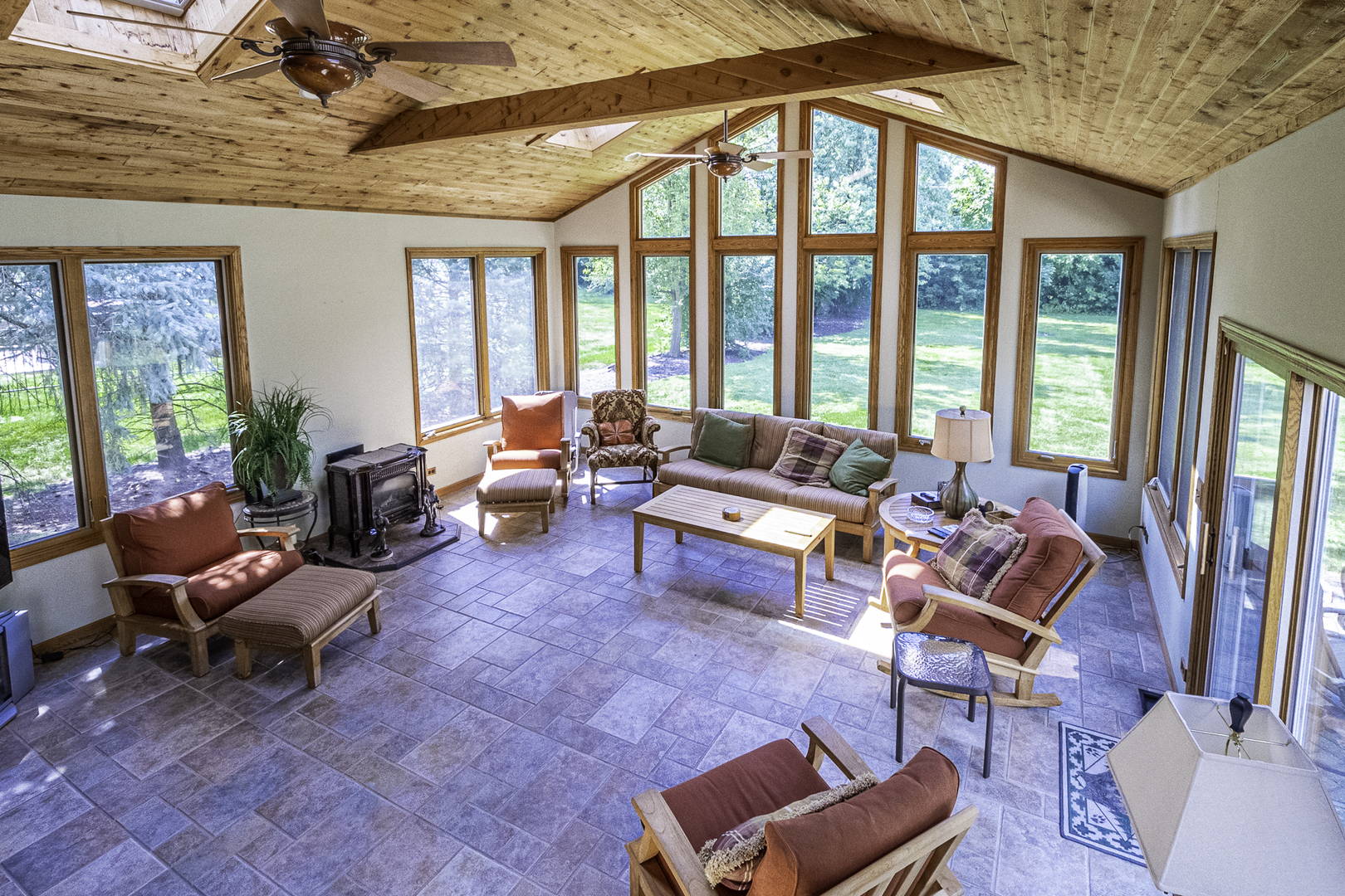 4214 Venard Road Downers Grove, IL 60515 - Photo 11 of 45 a living room with furniture and floor to ceiling windows