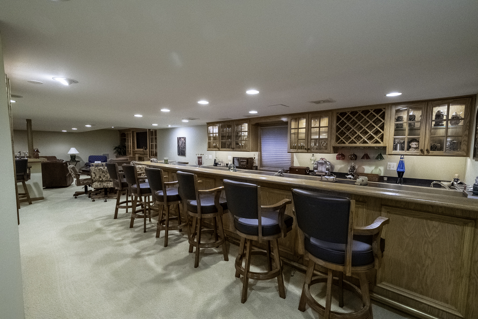 4214 Venard Road Downers Grove, IL 60515 - Photo 18 of 45 a kitchen with lots of furniture a sink appliances and a dining table