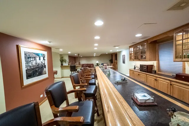 a view of a living room a dining room with furniture