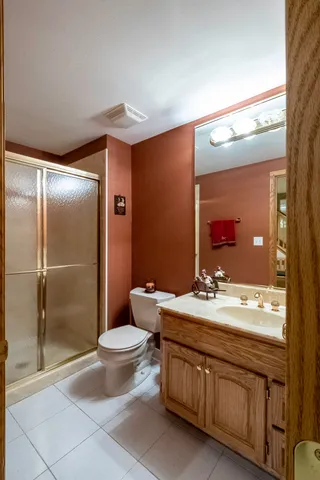 a house view with swimming pool in front of it