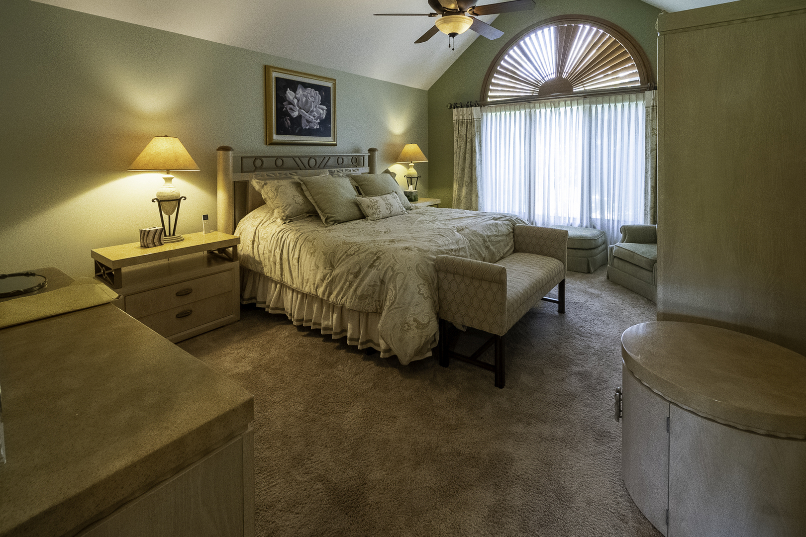 4214 Venard Road Downers Grove, IL 60515 - Photo 27 of 45 a spacious bedroom with a bed and a window