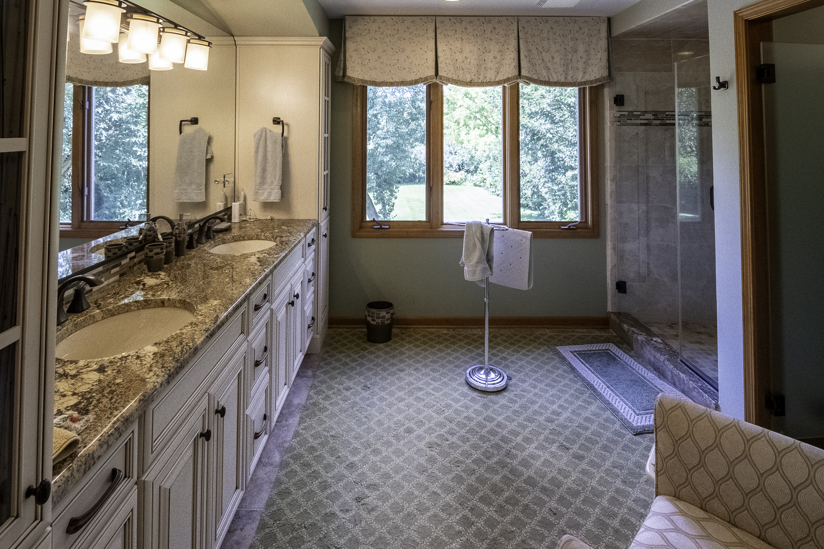 4214 Venard Road Downers Grove, IL 60515 - Photo 28 of 45 a bathroom with a granite countertop sink and a large mirror