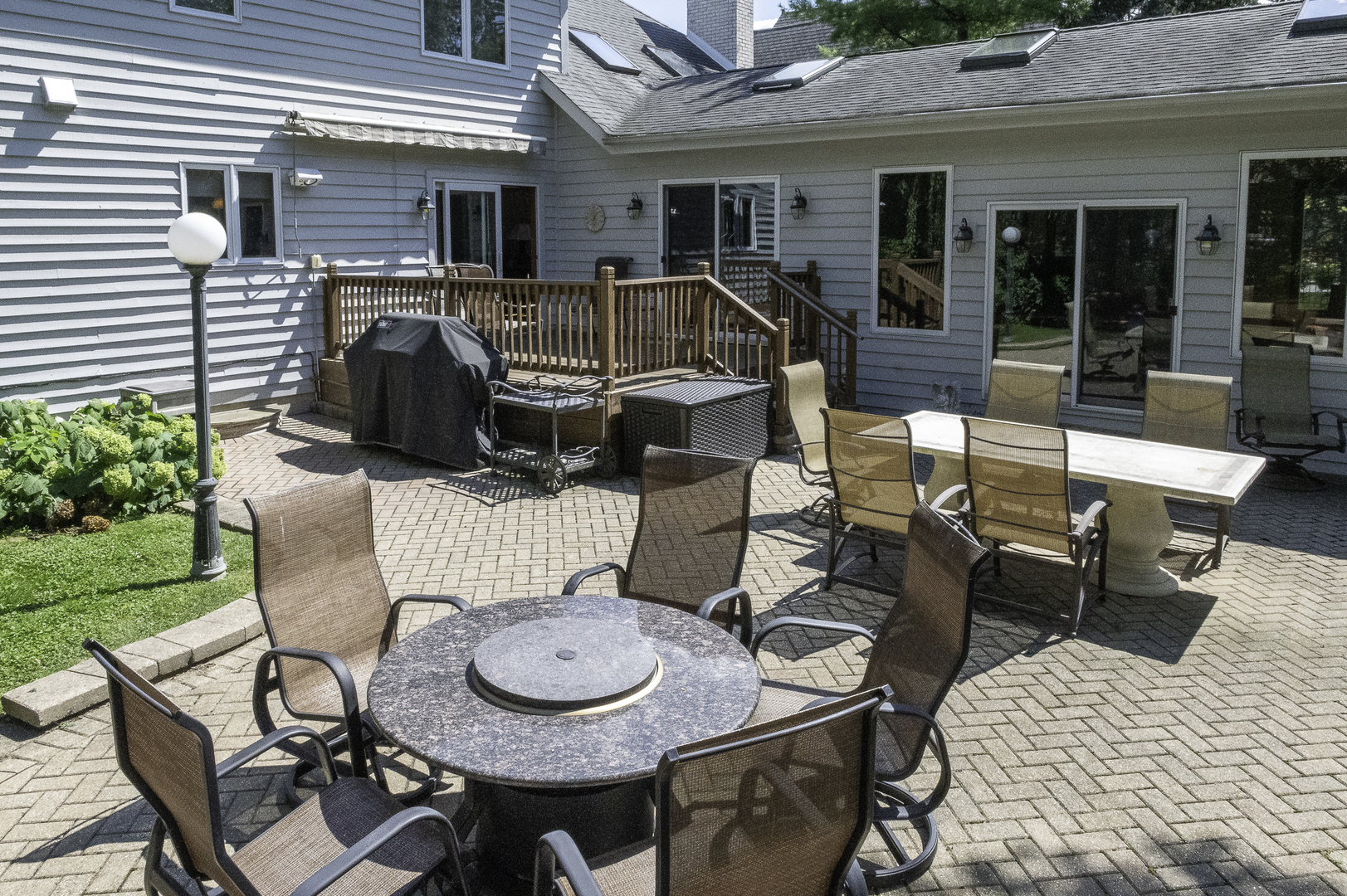 4214 Venard Road Downers Grove, IL 60515 - Photo 39 of 45 a view of a patio with table and chairs