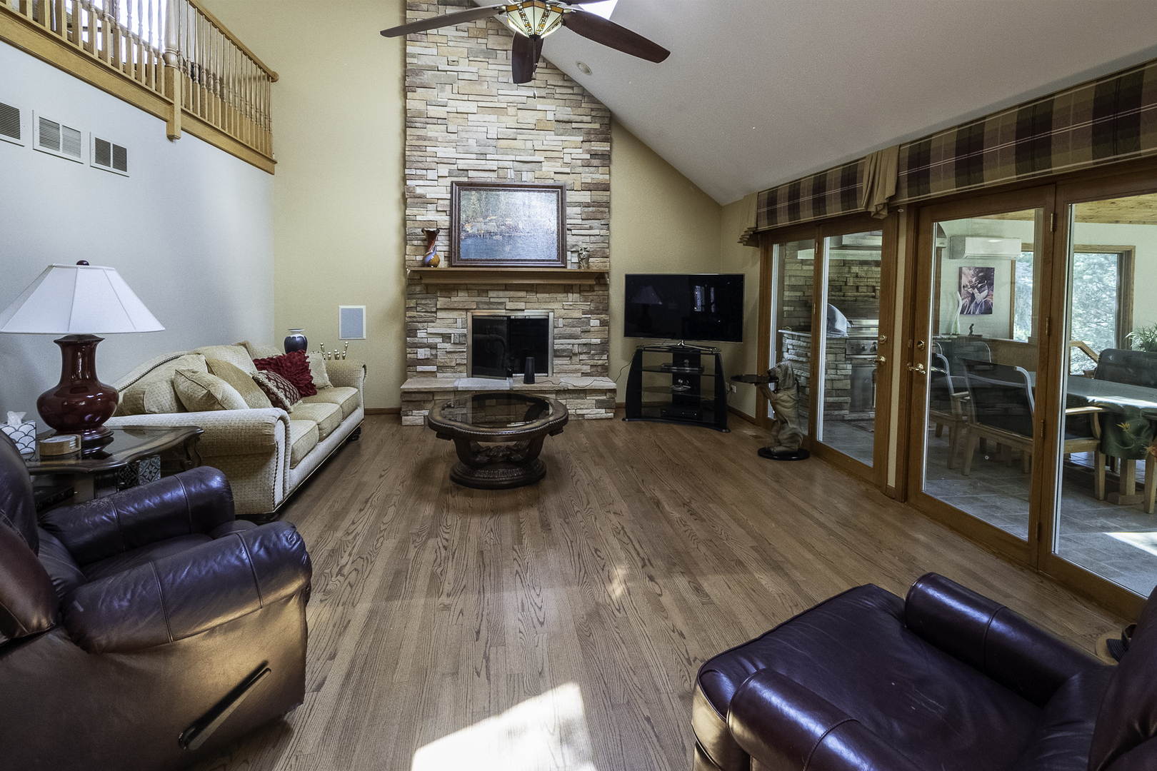 4214 Venard Road Downers Grove, IL 60515 - Photo 7 of 45 a living room with furniture and a fireplace