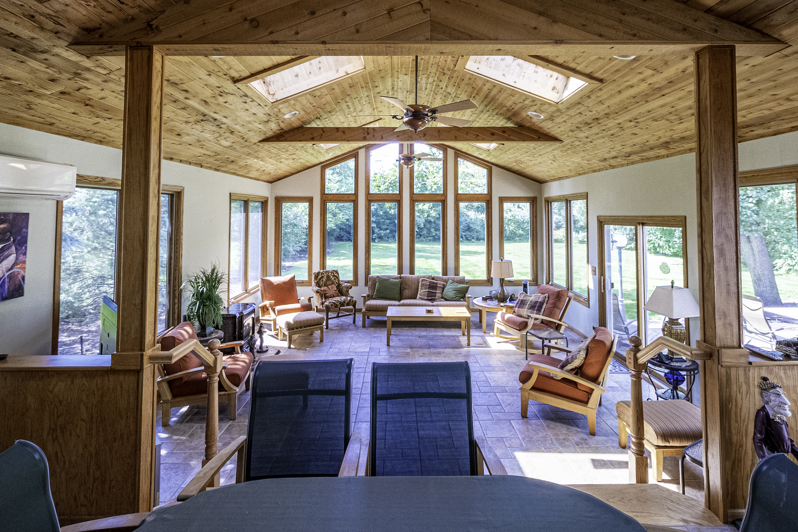 4214 Venard Road Downers Grove, IL 60515 - Photo 10 of 45 a living room filled with furniture and floor to ceiling windows