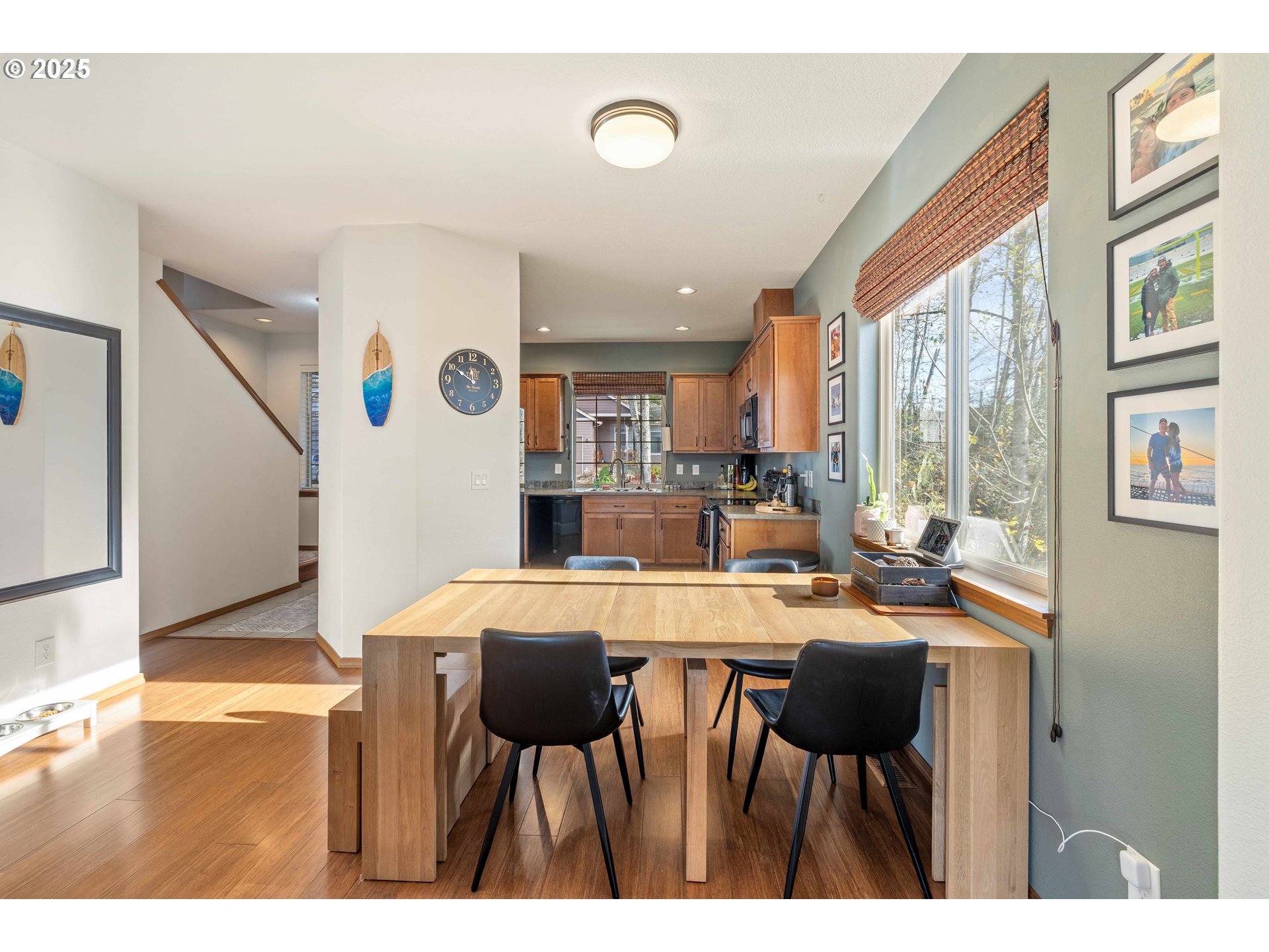 18465 Meadow Avenue Sandy, OR 97055 - Photo 11 of 43 a view of a dining room with furniture and a chandelier