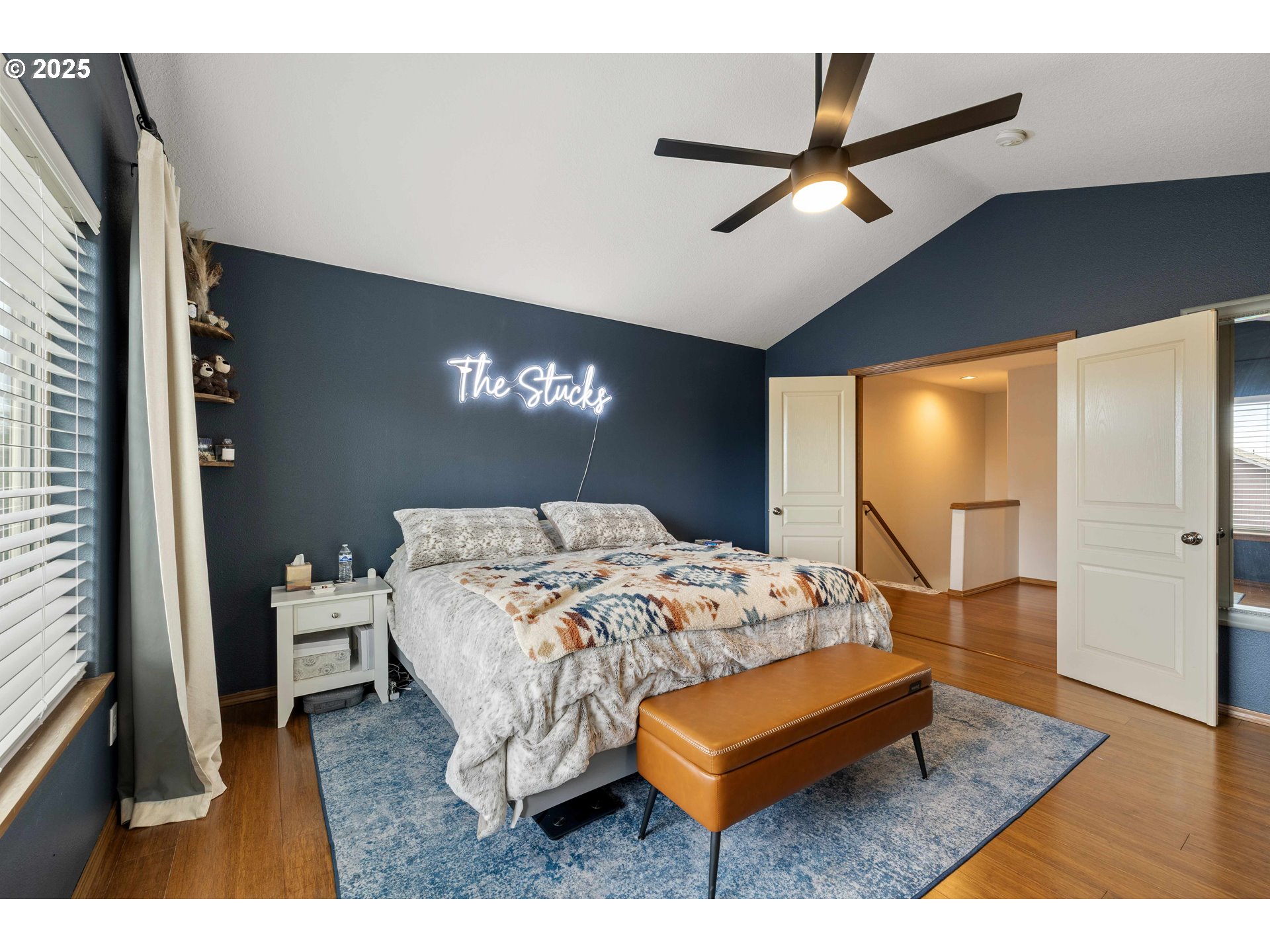 18465 Meadow Avenue Sandy, OR 97055 - Photo 20 of 43 a bedroom with a bed window and a walk in closet