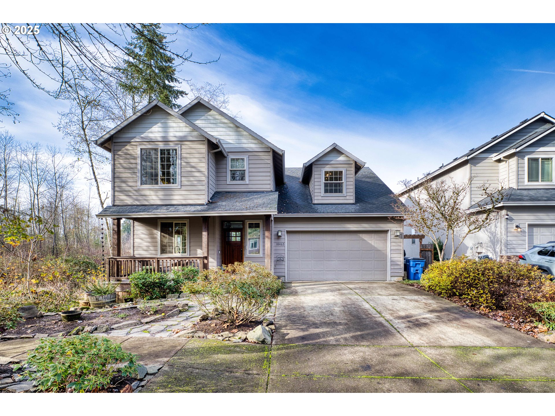 18465 Meadow Avenue Sandy, OR 97055 - Photo 2 of 43 a front view of a house with a yard