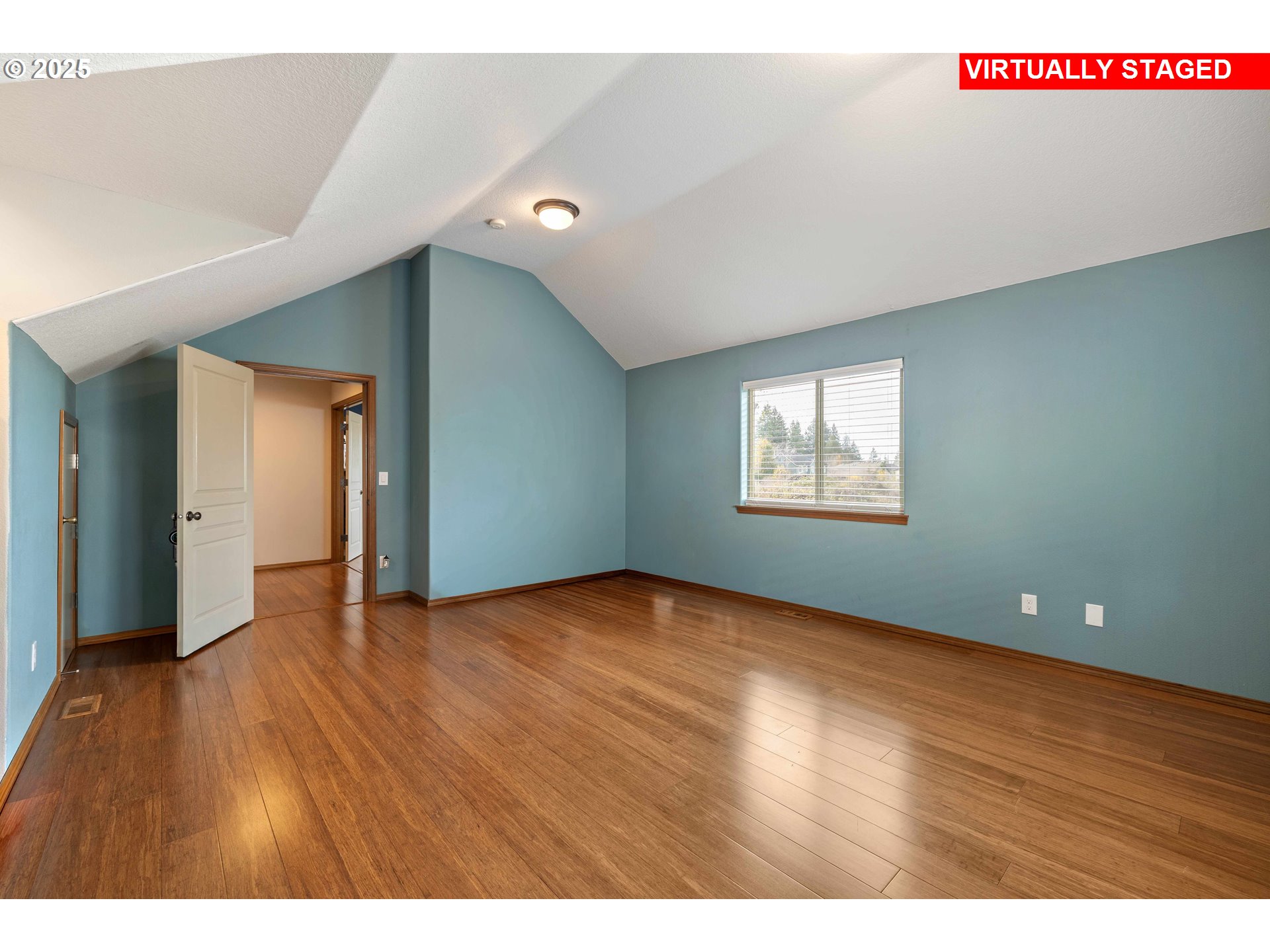 18465 Meadow Avenue Sandy, OR 97055 - Photo 29 of 43 a view of an empty room with wooden floor and a window