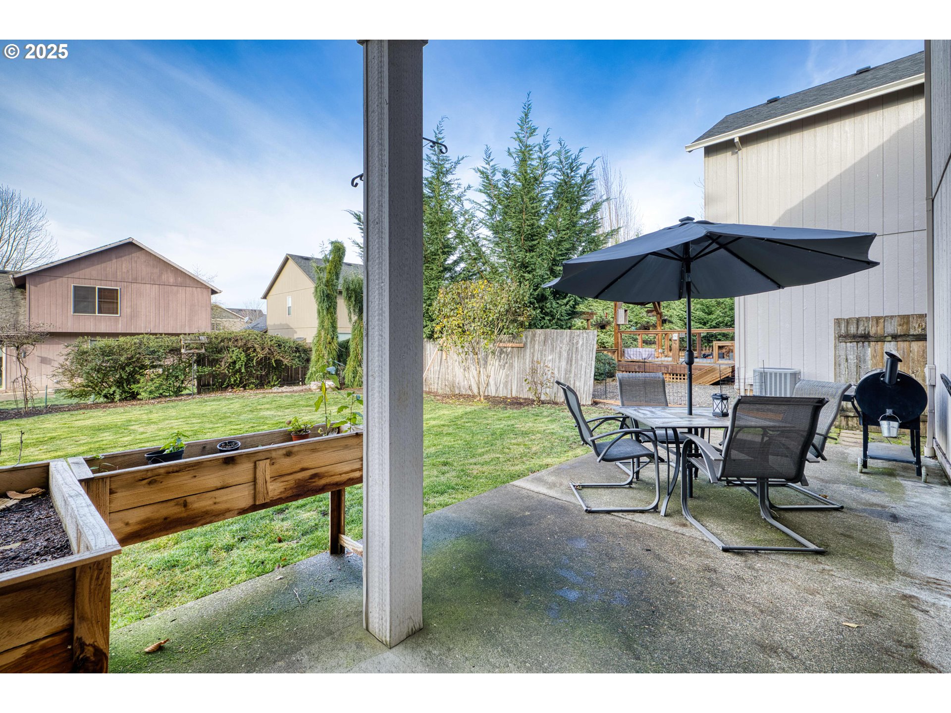 18465 Meadow Avenue Sandy, OR 97055 - Photo 35 of 43 a view of a chairs and table in the backyard