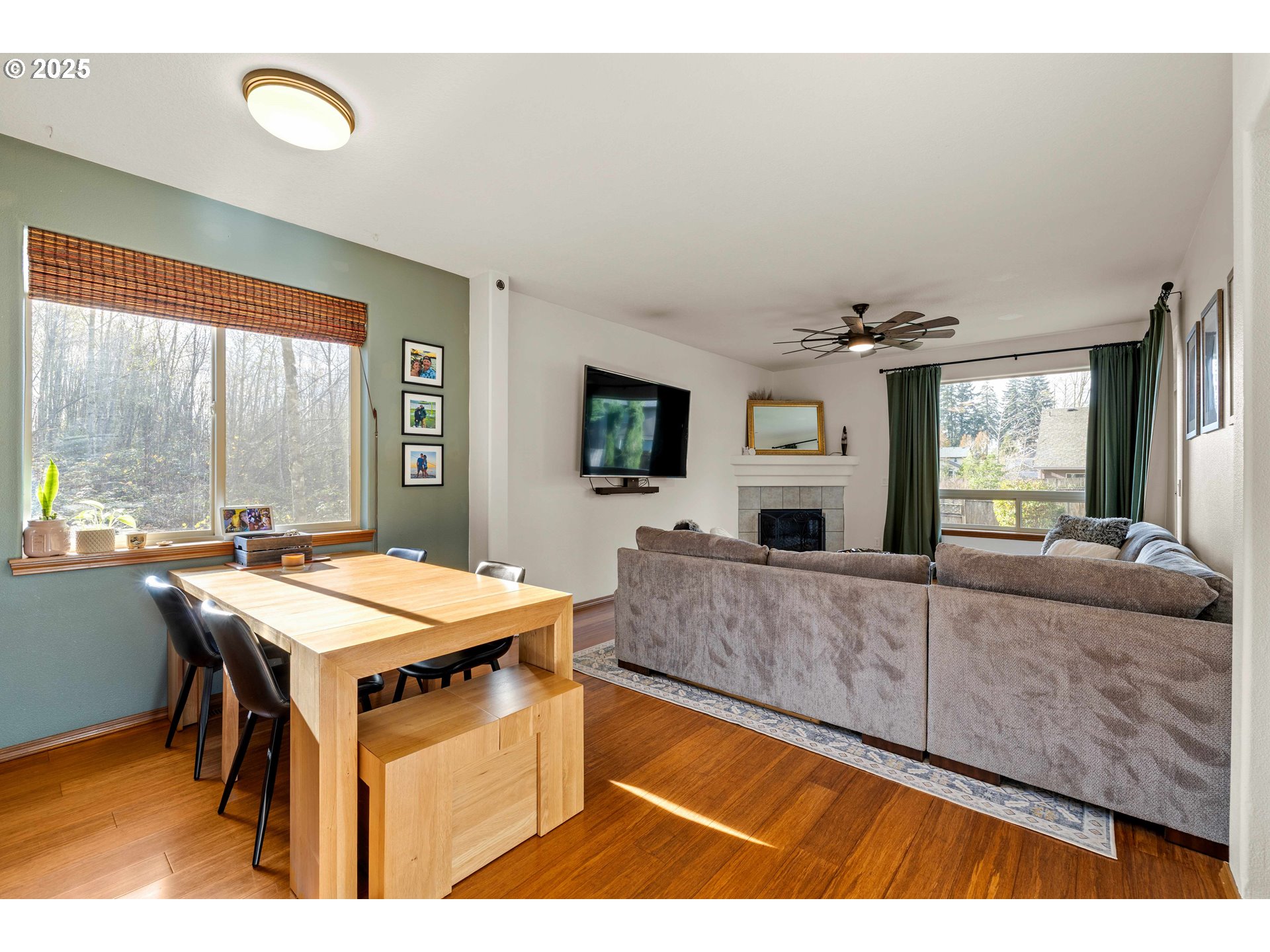 18465 Meadow Avenue Sandy, OR 97055 - Photo 5 of 43 a living room with furniture a flat screen tv and a large window