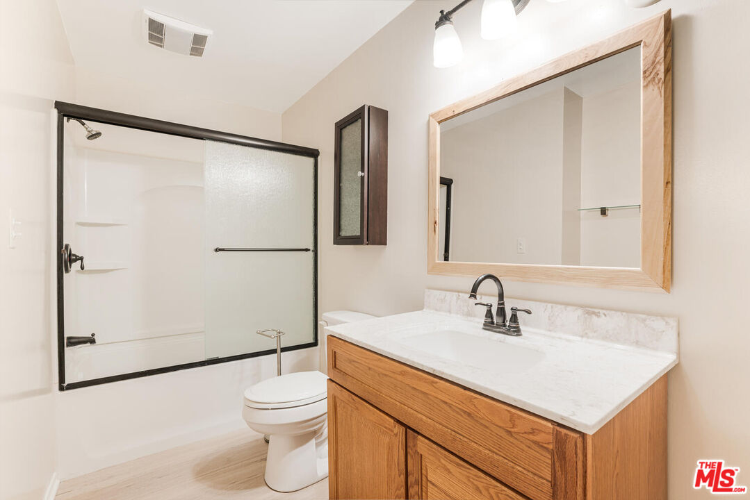 6475 Kanan Dume Road Malibu, CA 90265 - Photo 11 of 17 a bathroom with a sink a toilet and shower
