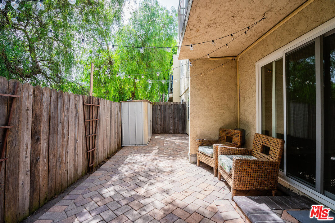 6475 Kanan Dume Road Malibu, CA 90265 - Photo 13 of 17 a bedroom with a bed and a view of the house