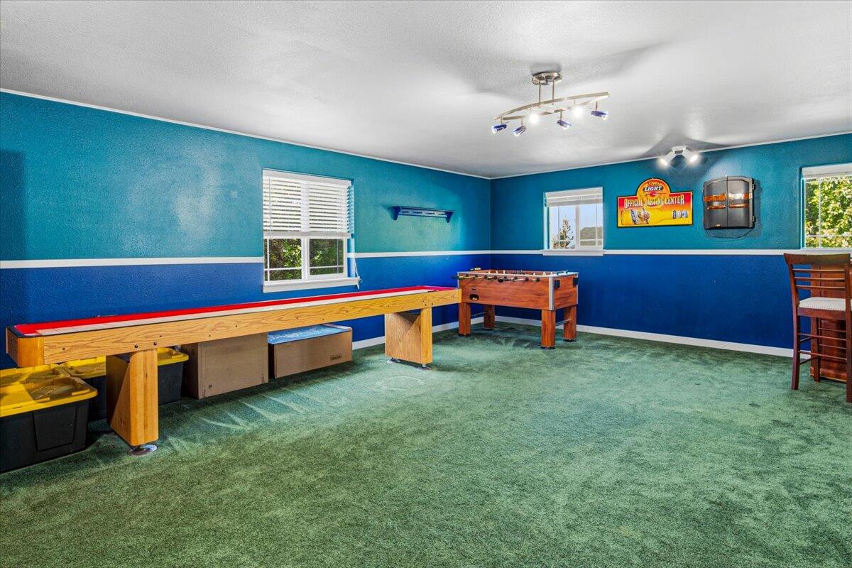 1339 Southwest Rimrock Way Redmond, OR 97756 - Photo 17 of 26 a reading room with furniture and window