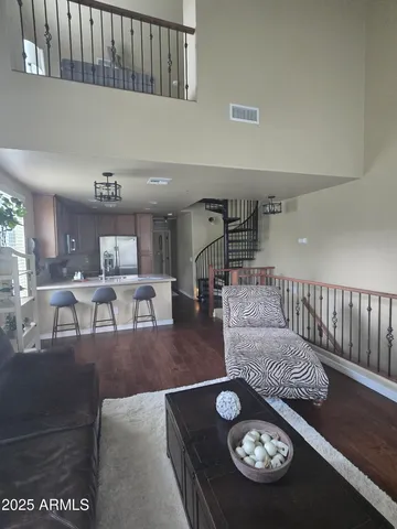 a living room with furniture and a table