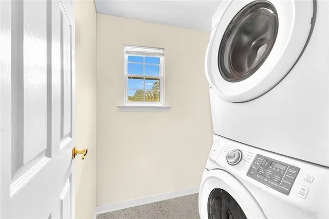 an aerial view of a house with a yard basket ball court and outdoor seating