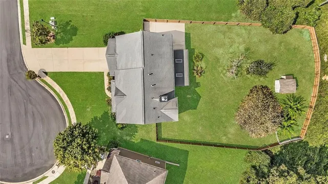 a view of a swimming pool with a patio