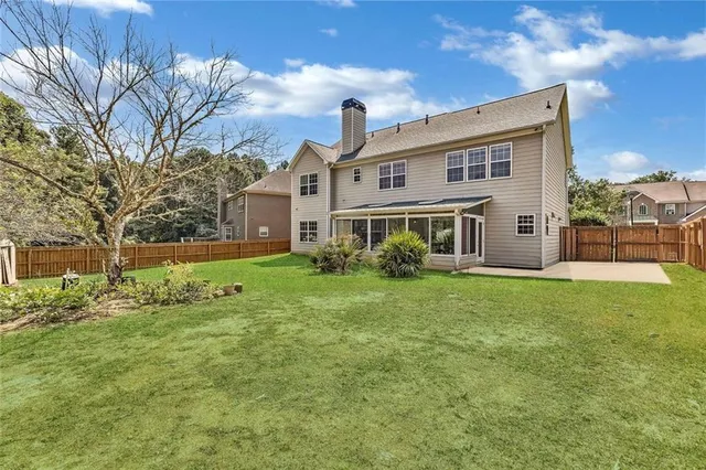 a front view of house with yard
