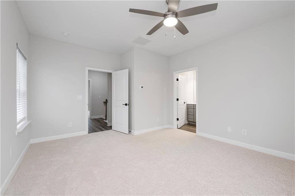 2010 Main Street Northwest Atlanta, GA 30318 - Photo 18 of 37 a view of empty room with ceiling fan