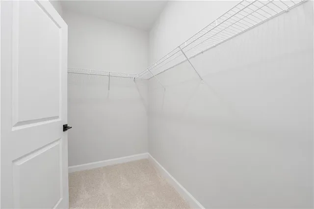 a bathroom with a double vanity sink toilet mirror and shower