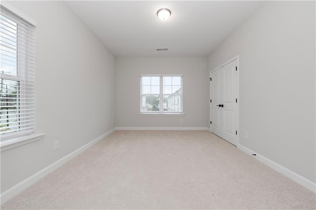 2010 Main Street Northwest Atlanta, GA 30318 - Photo 22 of 37 an empty room with a window