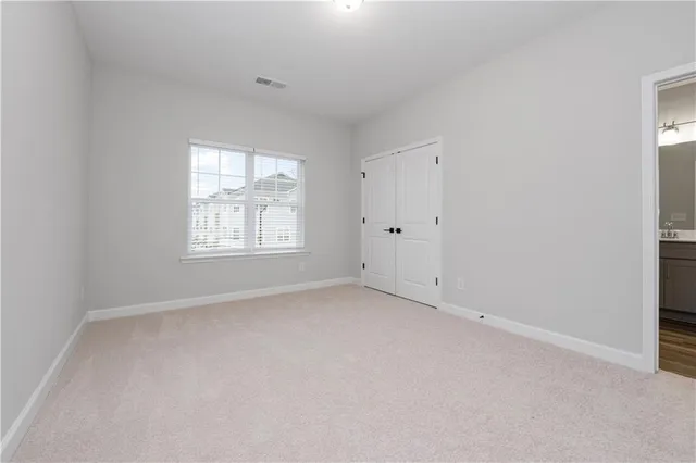 a bathroom with a sink a vanity and a mirror