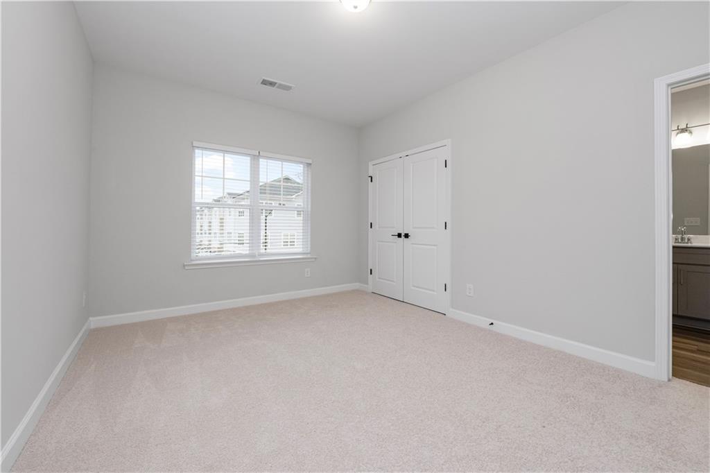 2010 Main Street Northwest Atlanta, GA 30318 - Photo 23 of 37 an empty room with windows