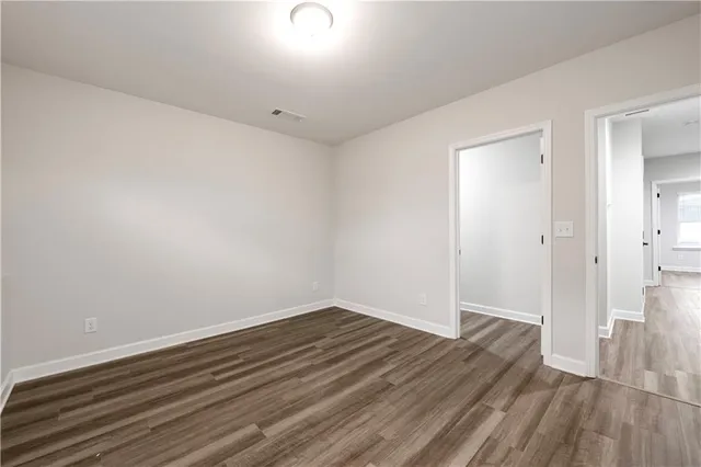 a bathroom with a sink a bathtub and a mirror