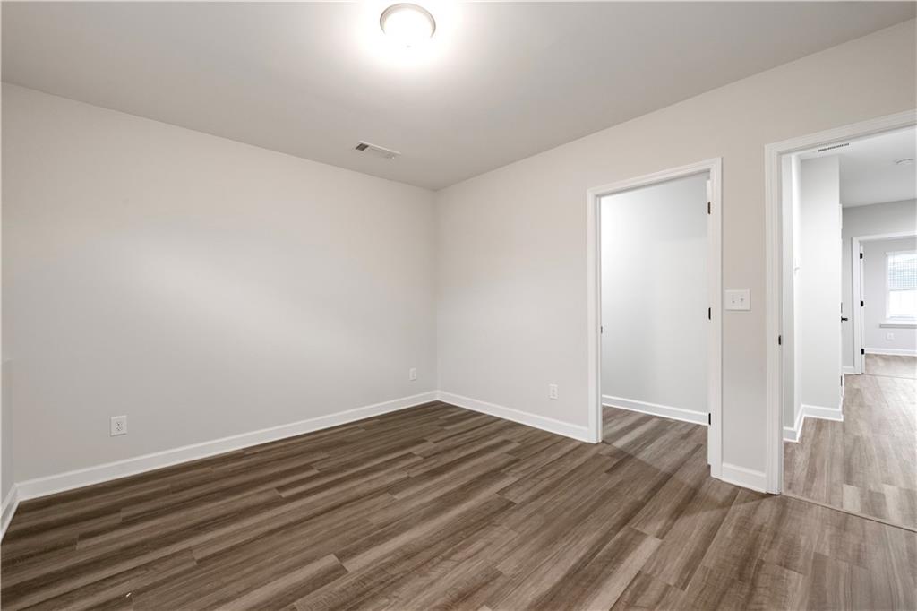 2010 Main Street Northwest Atlanta, GA 30318 - Photo 28 of 37 wooden floor in a empty room