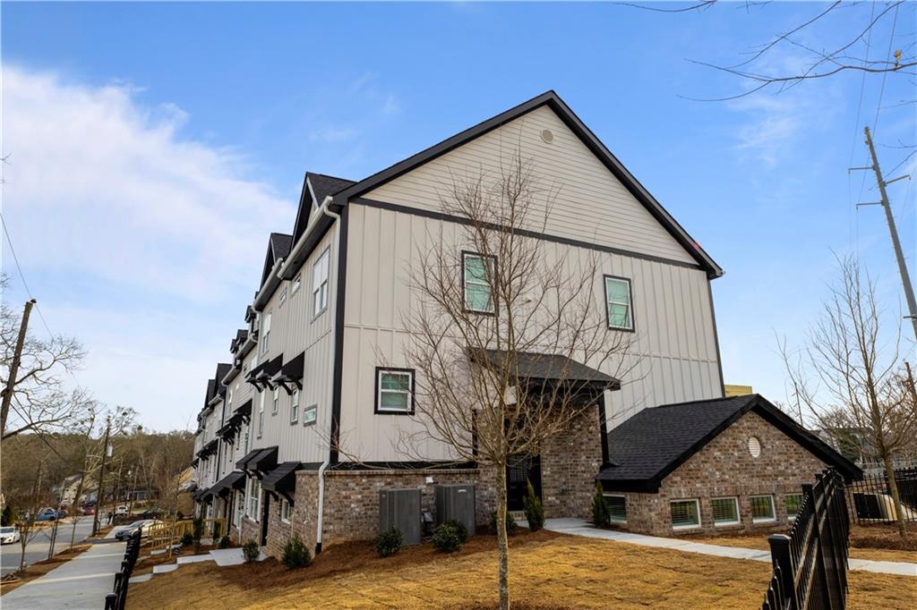2010 Main Street Northwest Atlanta, GA 30318 - Photo 33 of 37 a view of a house with wooden stairs