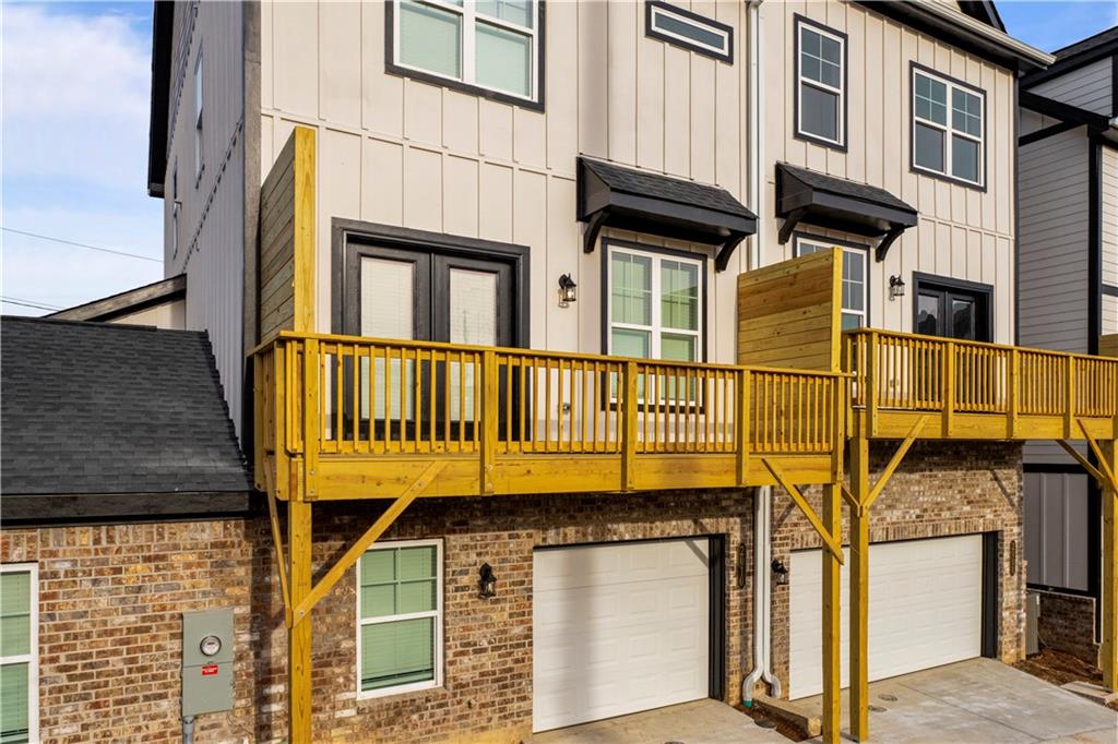 2010 Main Street Northwest Atlanta, GA 30318 - Photo 34 of 37 a view of a brick house with many windows