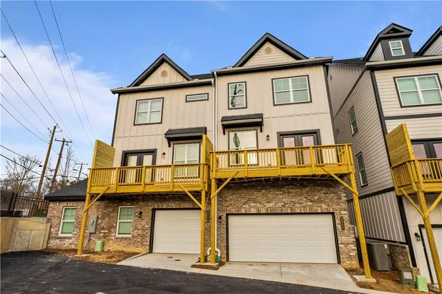 front view of a house with a small yard