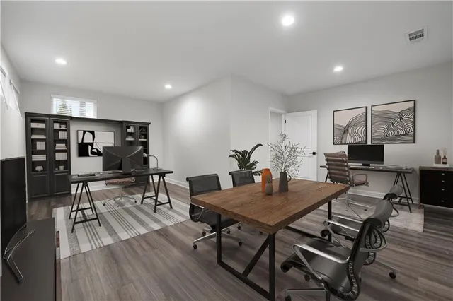 a view of a dining room with furniture