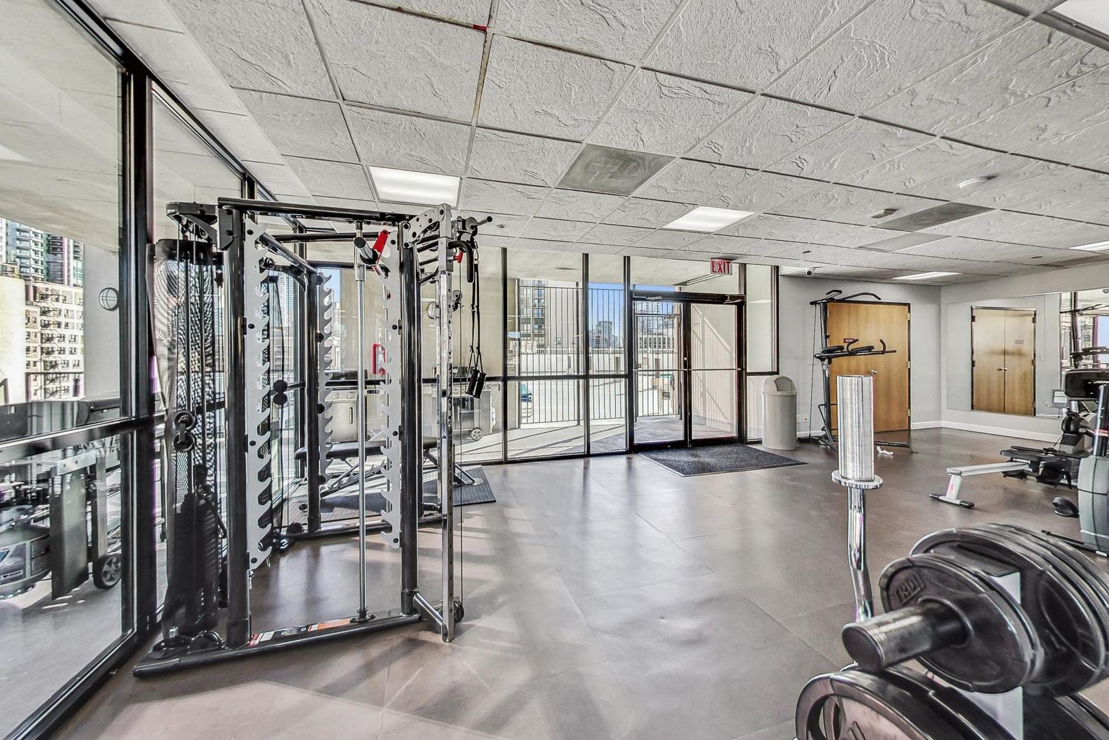 1122 North Clark Street, Unit 3705 Chicago, IL 60610 - Photo 27 of 38 a view of a room with gym equipment
