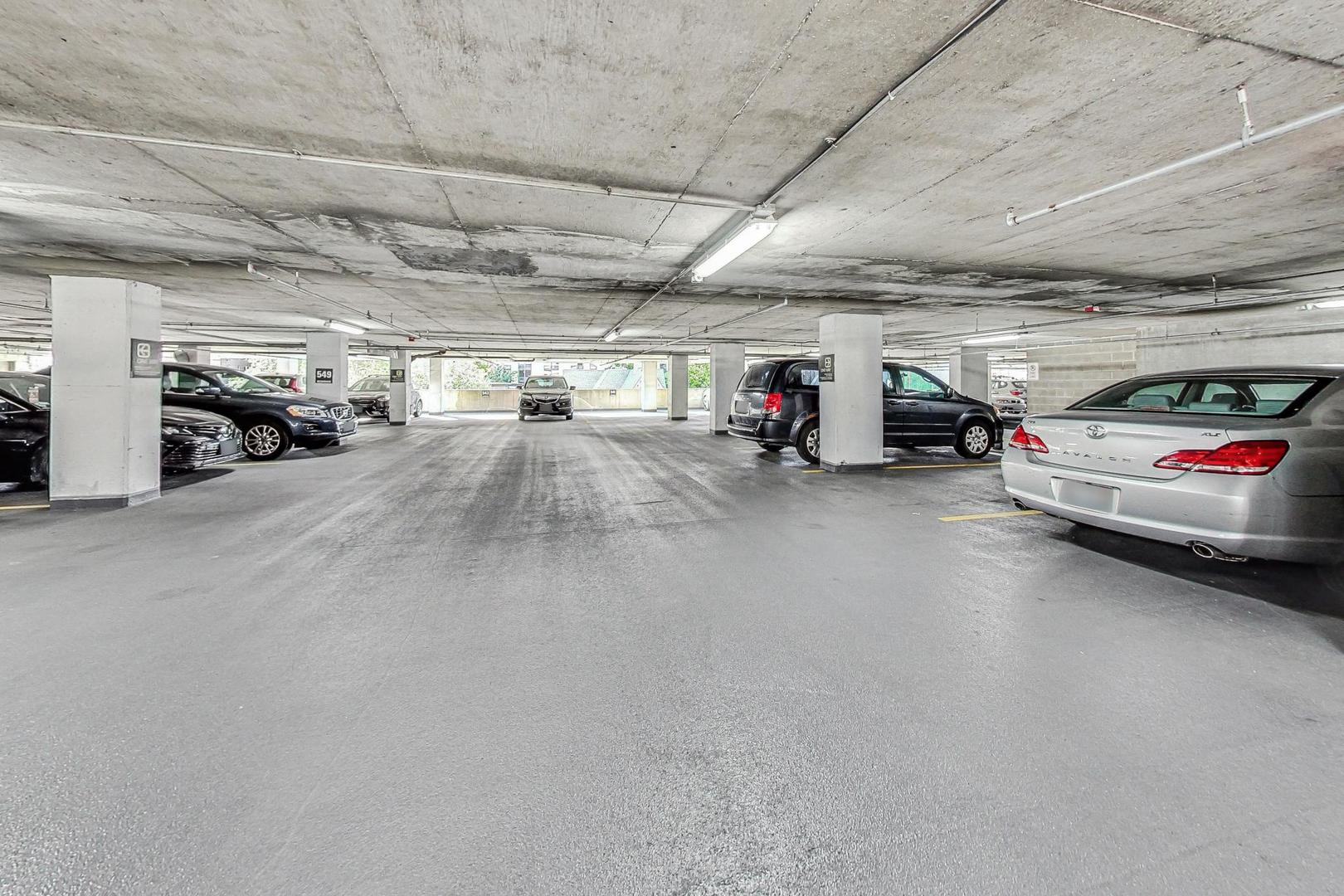 1122 North Clark Street, Unit 3705 Chicago, IL 60610 - Photo 37 of 38 a view of parking garage with cars