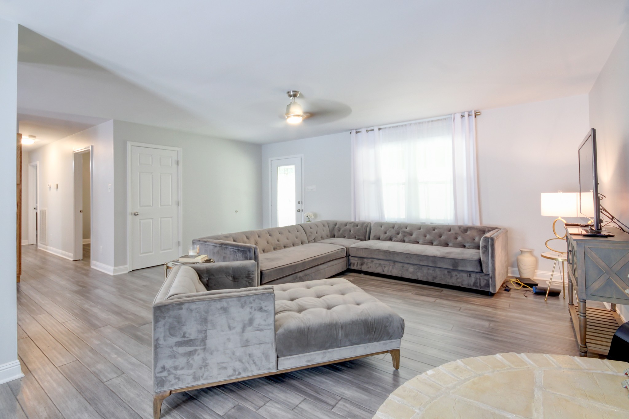 4141 Sango Road Clarksville, TN 37043 - Photo 11 of 57 a living room with furniture and a couch