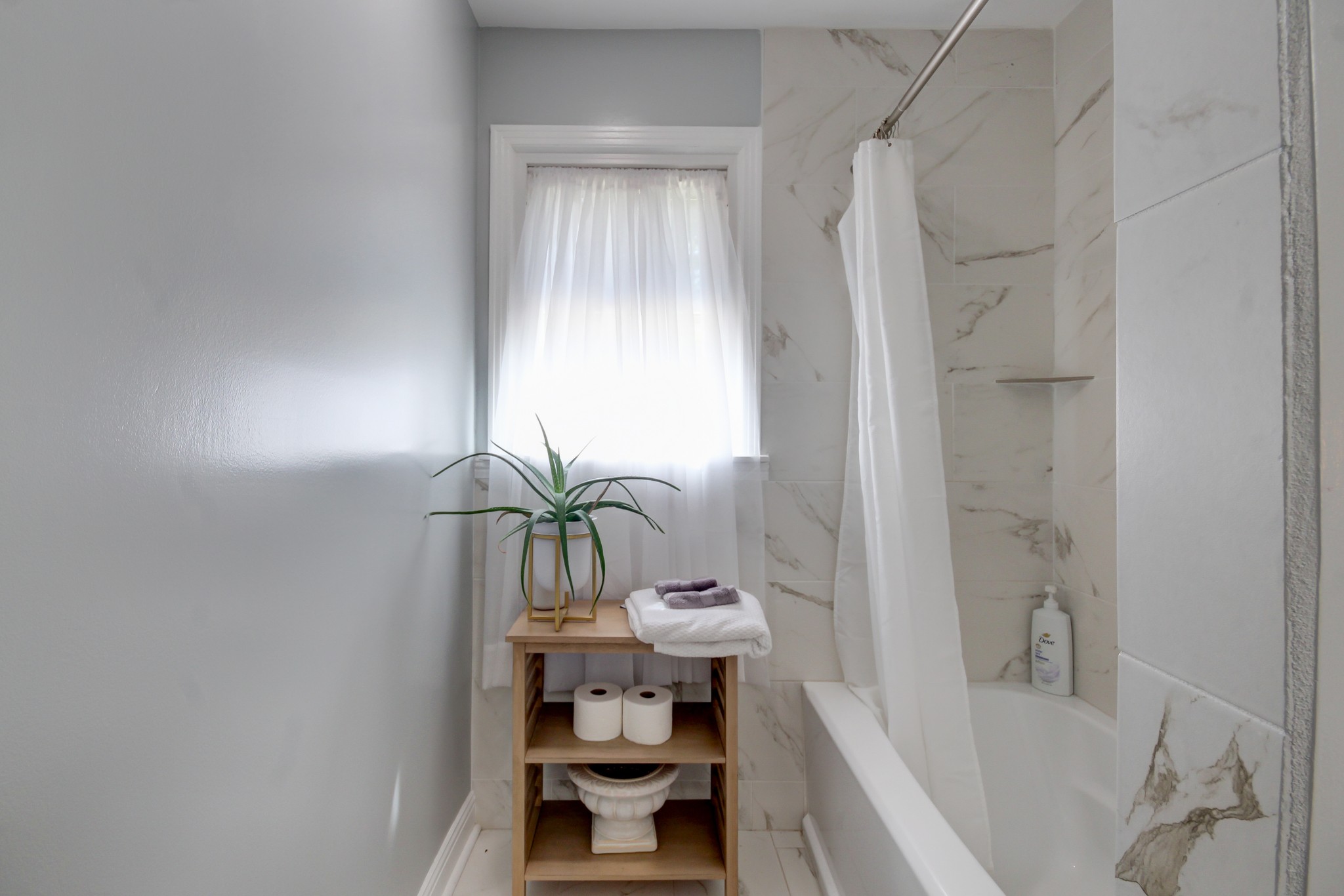 4141 Sango Road Clarksville, TN 37043 - Photo 26 of 57 a bathroom with a bathtub and shower
