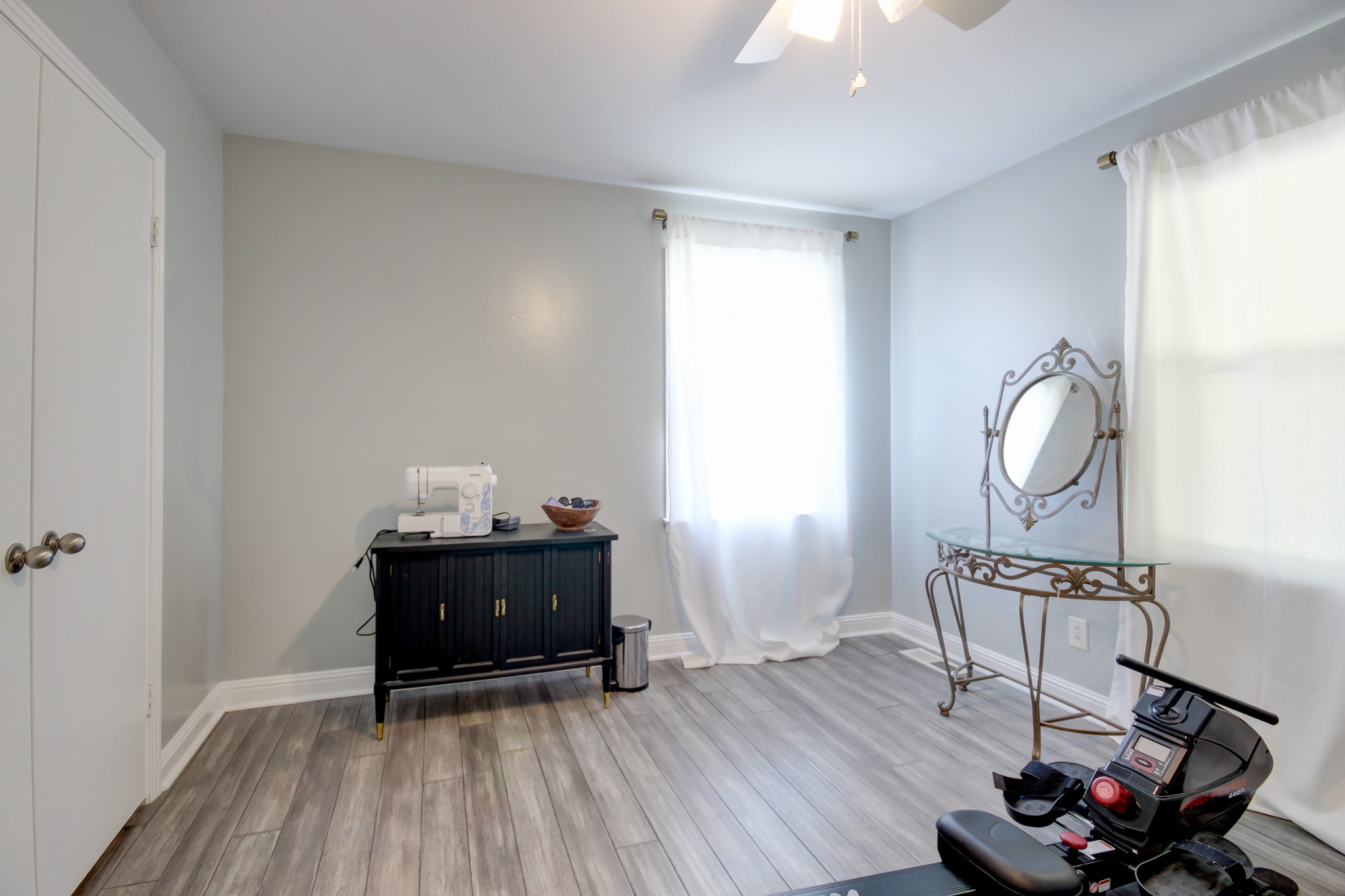 4141 Sango Road Clarksville, TN 37043 - Photo 29 of 57 a view of a room with wooden floor and windows